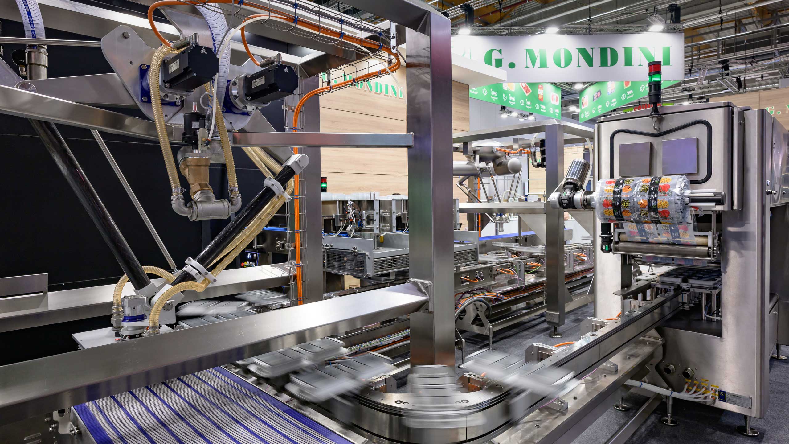 Automatisierte Verpackungsanlage von G. Mondini auf einer Fachmesse