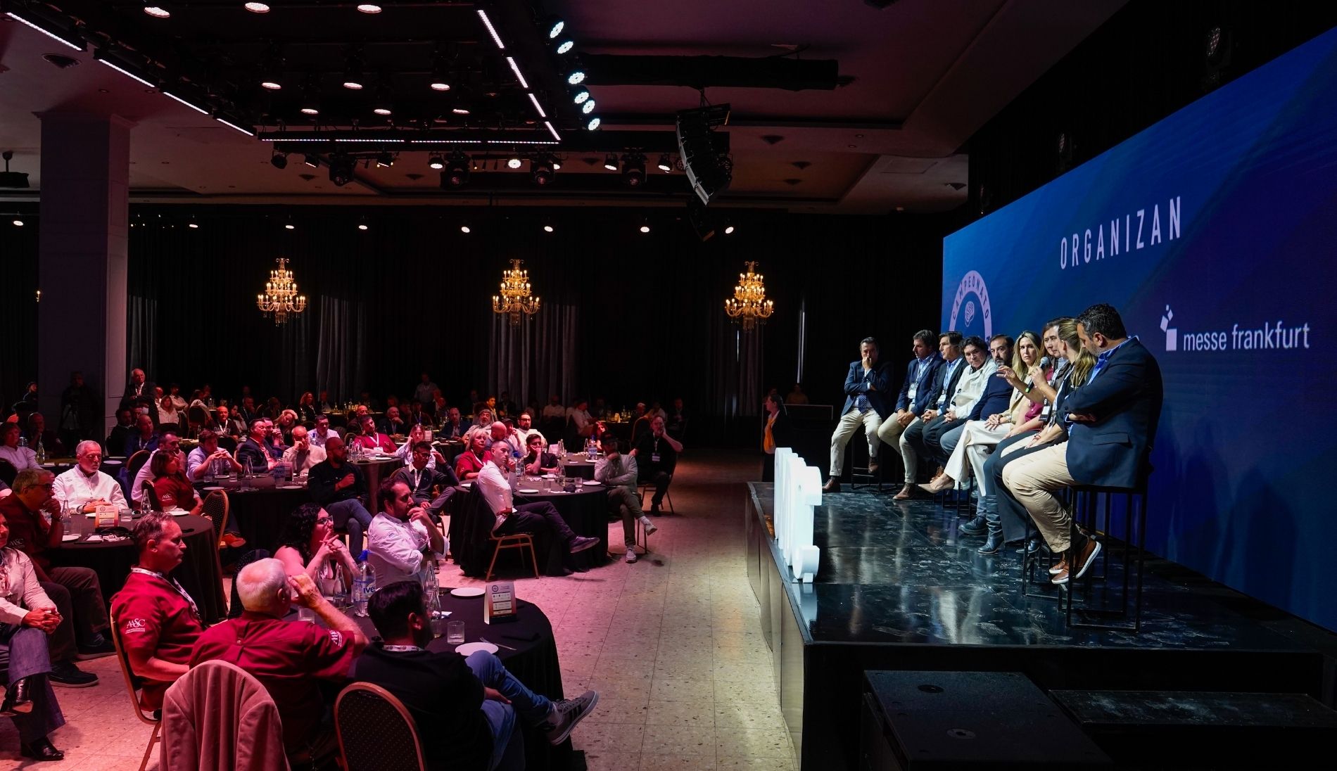 Podiumsdiskussion im Rahmen eines internationalen Fleischwettbewerbs